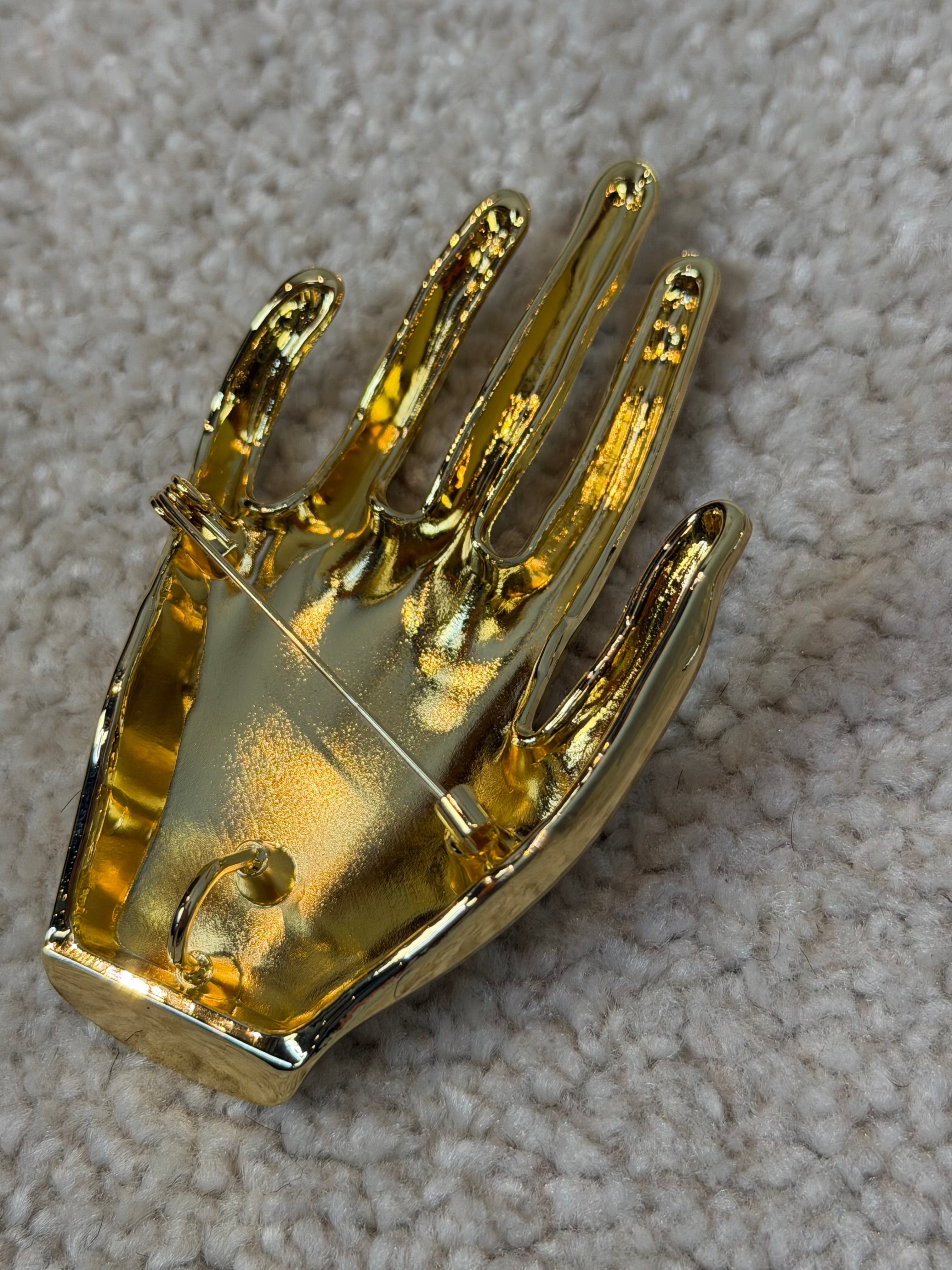 Spilla mano