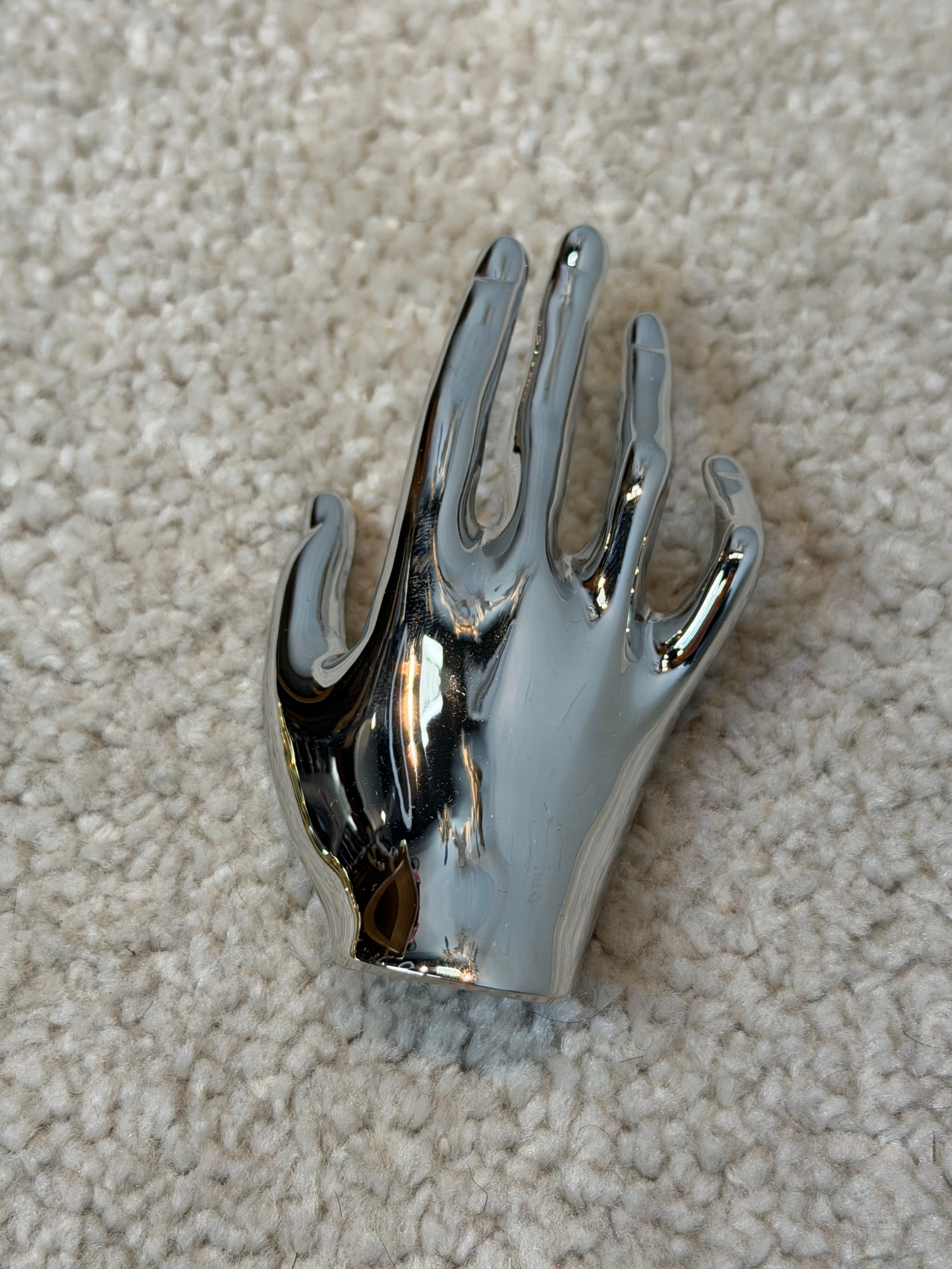 Spilla mano