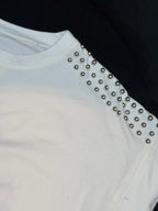 T-shirt borchia